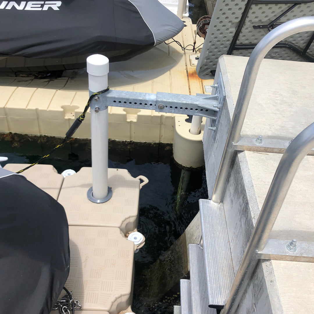 Galvanized steel adjustable pile support for 2-7/8" pipes, ensuring secure dock installation and resilience in different water levels.