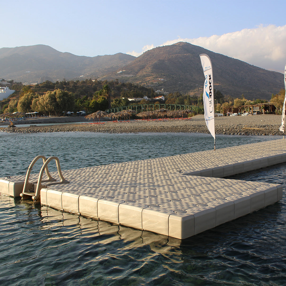 Candock Edge Cube - HDPE dock edge accessory with anti-skid surface, available in beige and grey. Regular dimensions: 48x24 cm, Corner dimensions: 24x24 cm. Improves dock safety and appearance.