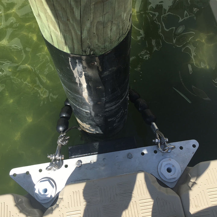 Candock adjustable pile guide featuring rollers on durable stainless steel cables for secure dock attachment