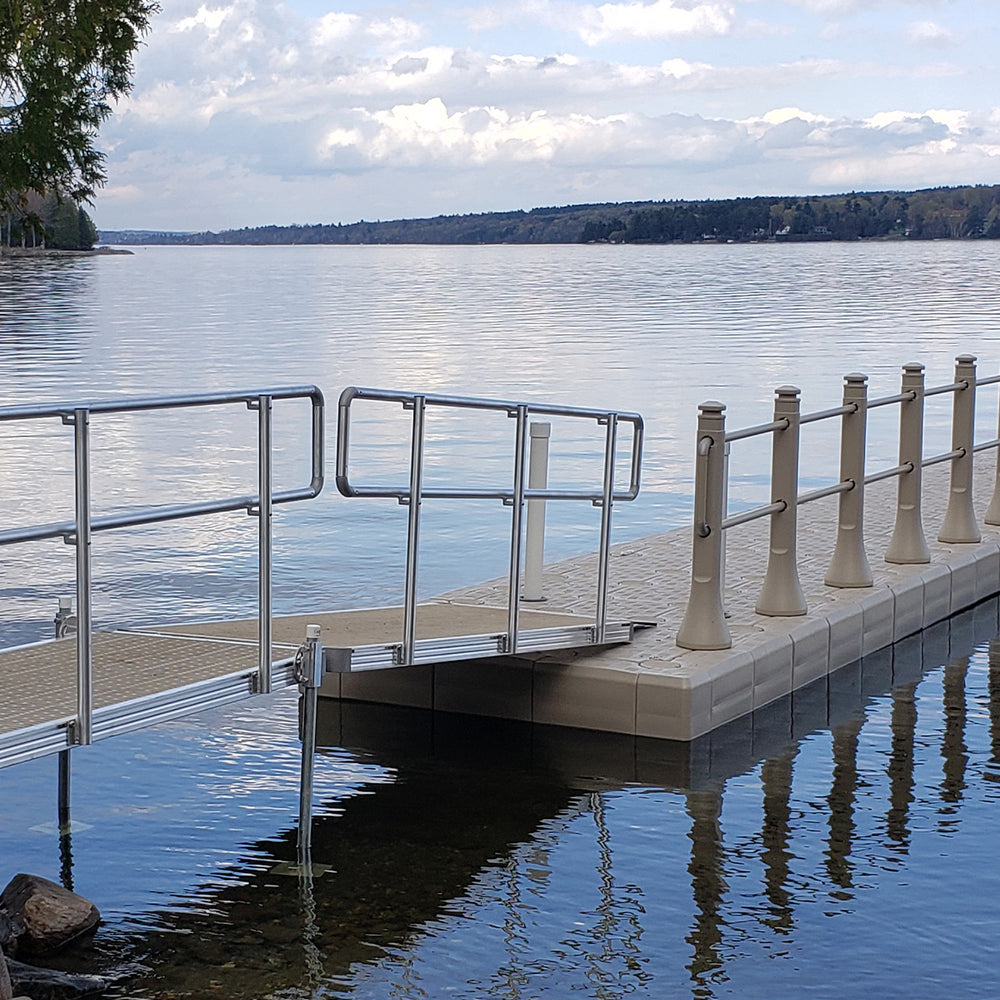 Aluminum handrail system by Candock, designed for seamless integration with PVC handrails on docks