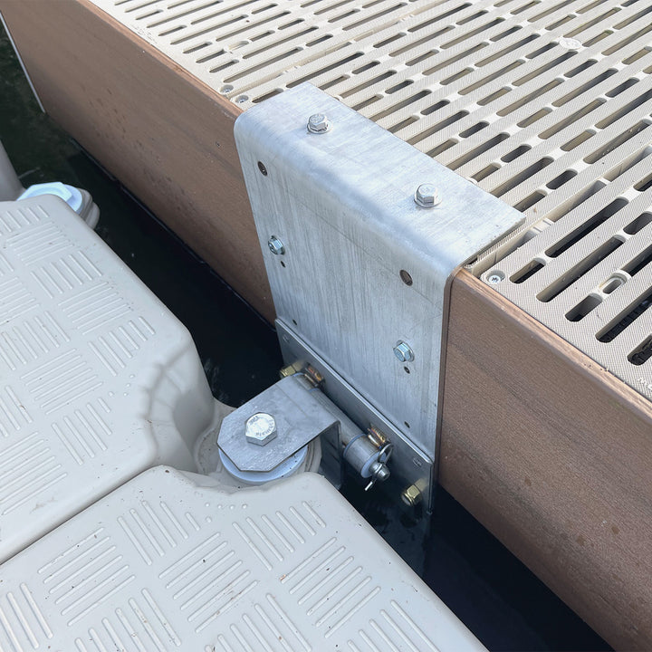 Secure wall anchoring for Candock docks with quick pin system, allowing easy and efficient installation and removal on robust surfaces.